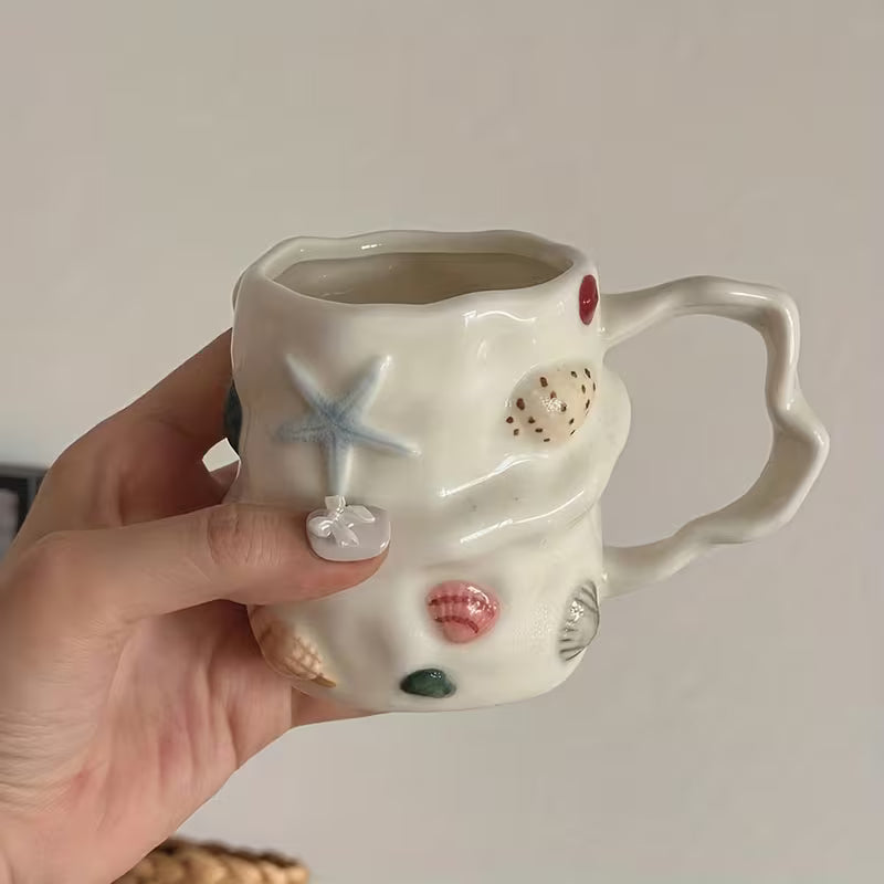 كوب سيراميك بنقشة صدفة إبداعية
