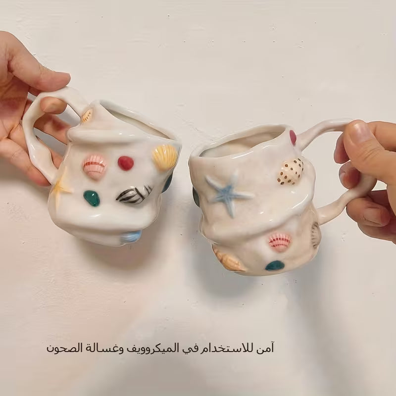 كوب سيراميك بنقشة صدفة إبداعية
